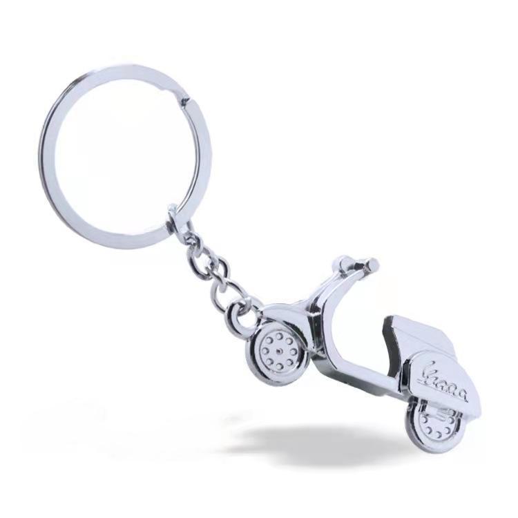 Лазерлік логотипі бар металл мотоцикл салпыншақ - бірегей жарнамалық сыйлық немесе шағын жетон.