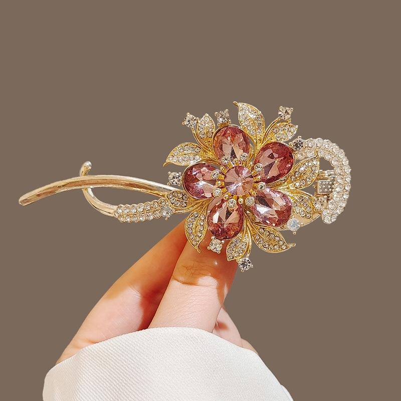 Factory direct fashion flower pearl twist clip elegant hairpin Internet celebrity head spring clip