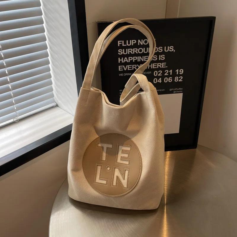 Cross-border New Letter Large-capacity Canvas Bag Women's Niche Fashion Shoulder Messenger Student Casual Tote Bag