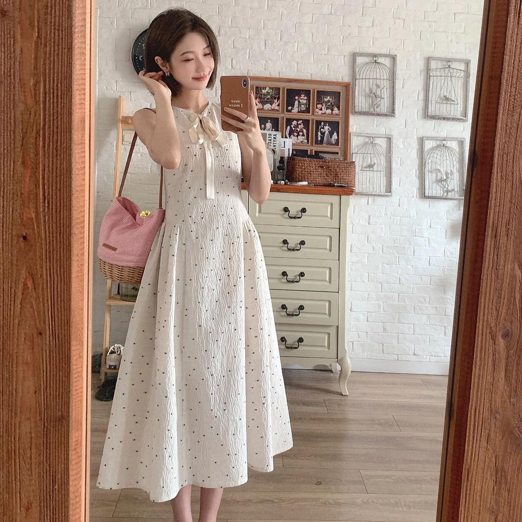 Beige polka dot jacquard sleeveless dress women's summer 2026 new French first love milk sweet A-shaped long skirt