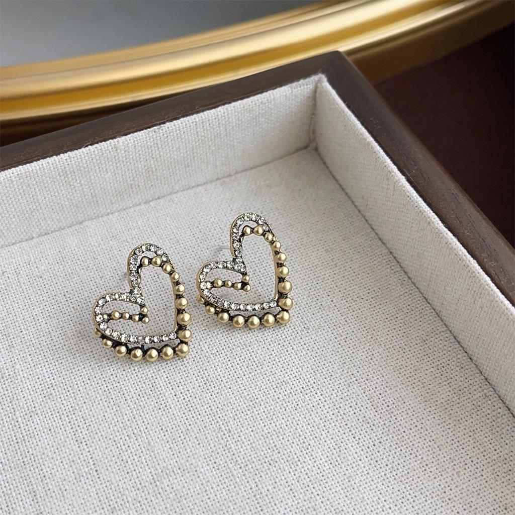 Boucles d'oreilles géométriques vintage en perles pour femmes - Style rétro de Hong Kong, luxe léger, sensation haut de gamme