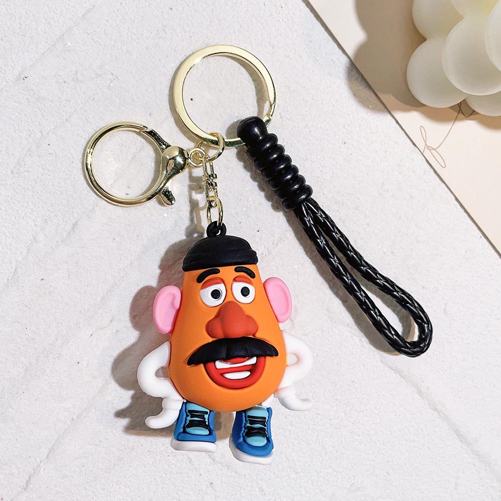 Best-Selling Toy Story Figures Keychain: Three-Eyed Alien, Buzz Lightyear, and Strawberry Bear Charms