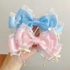 Grazioso fermaglio per capelli con nappe per bambini con fiocco e perle Accessorio portatile per feste e uso quotidiano
