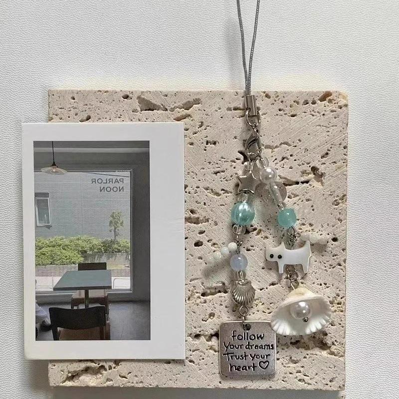 

Эксклюзив для новичков: Кулон в виде морской раковины кошки, брелок для телефона и ключей