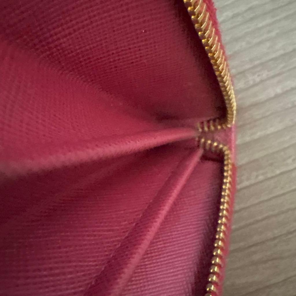 Used PRADA long wallet ribbon round zipper