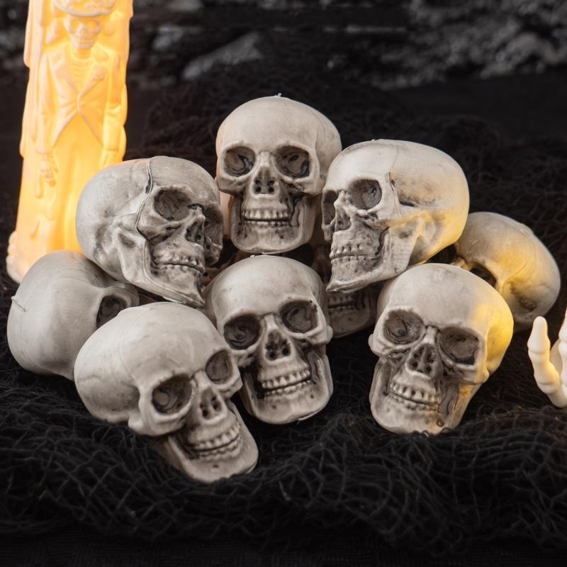Plastic Mini Skulls for Repeat Use, 10-Piece Halloween Decoration Set That Rinses with Water for Tables, Shelves, and Seasonal Displays