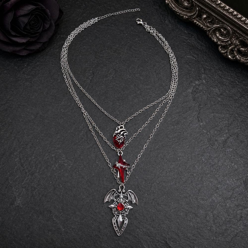 European/American Gothic Style Unisex Necklace with Three-Chain Clavicle, Red Heart, Blood-Colored Cross, and Devil Wings Pendant