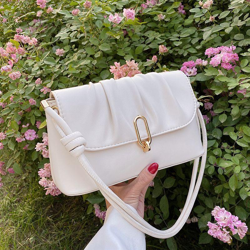 

Niche white bag women s 2025 new model is popular this year, versatile high-end shoulder bag, crossbody armpit bag
