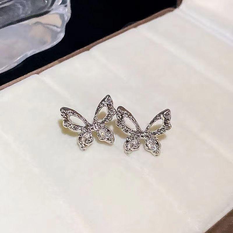 Silver needle super fairy hollow butterfly stud earrings women's niche design exquisite earrings high sense fashion versatile earrings