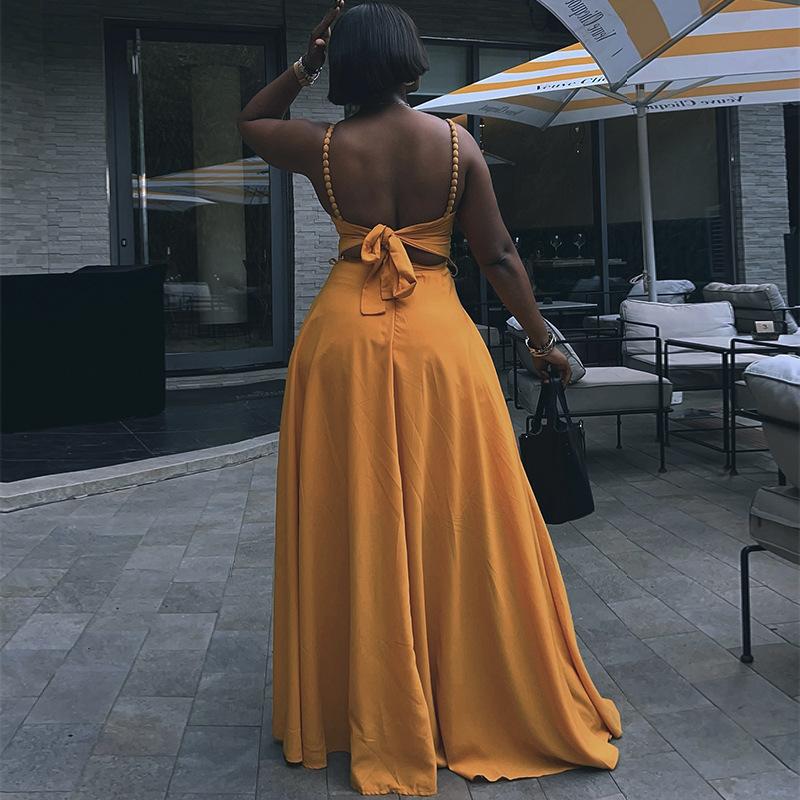 European and American women's clothing spring new fashion suspender strap backless slim pleated skirt solid color dress
