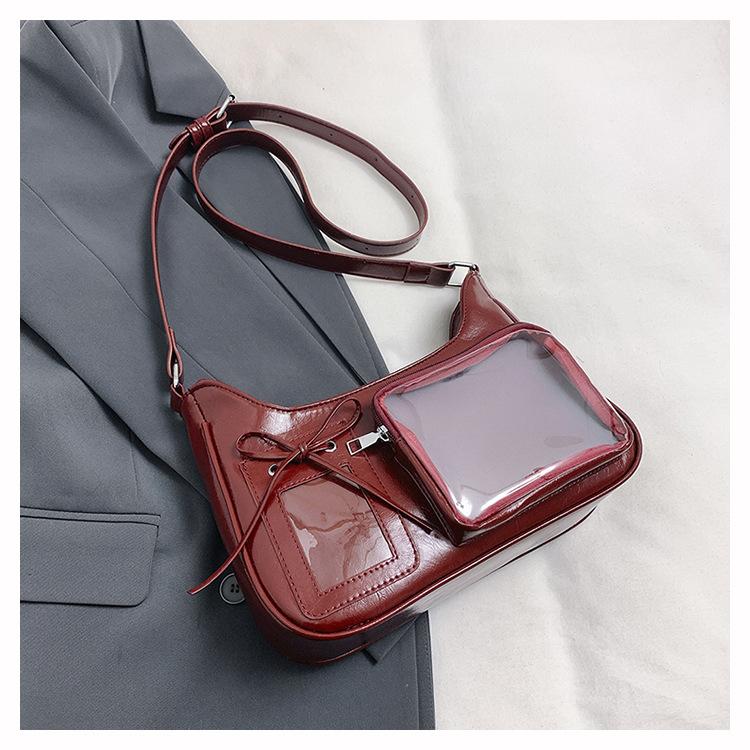 

High-value women s bags, shoulder bags, women s backpacks, messenger bags, two-dimensional design sense, small food intake, high-quality commuting бордовий