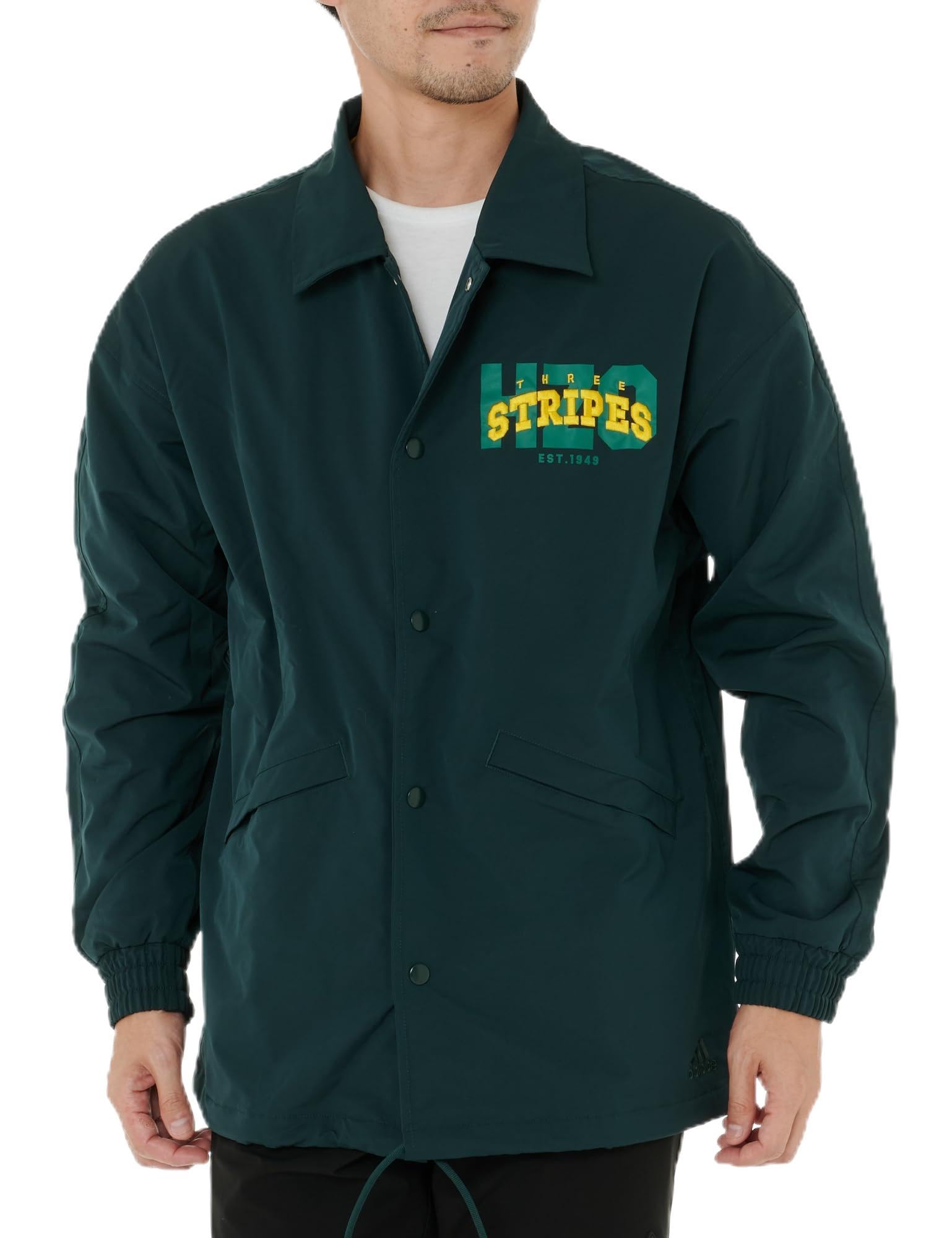 

Мужская тканая куртка-коуч Adidas KWX87 цвета Shadow Green свободного кроя с подкладкой из матового трикотажа (JG8561)