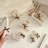 Pearl love bow hairpin rice bead weaving beige series grab clip literary light luxury hair accessories