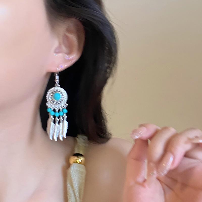 Exotic high-end fringed earrings, niche retro ethnic style earrings, French heavy industry bohemian earrings.