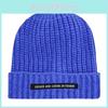 Knitted Winter Beanie Hat With Ear Covers For Fashionable Cold Weather Wear**