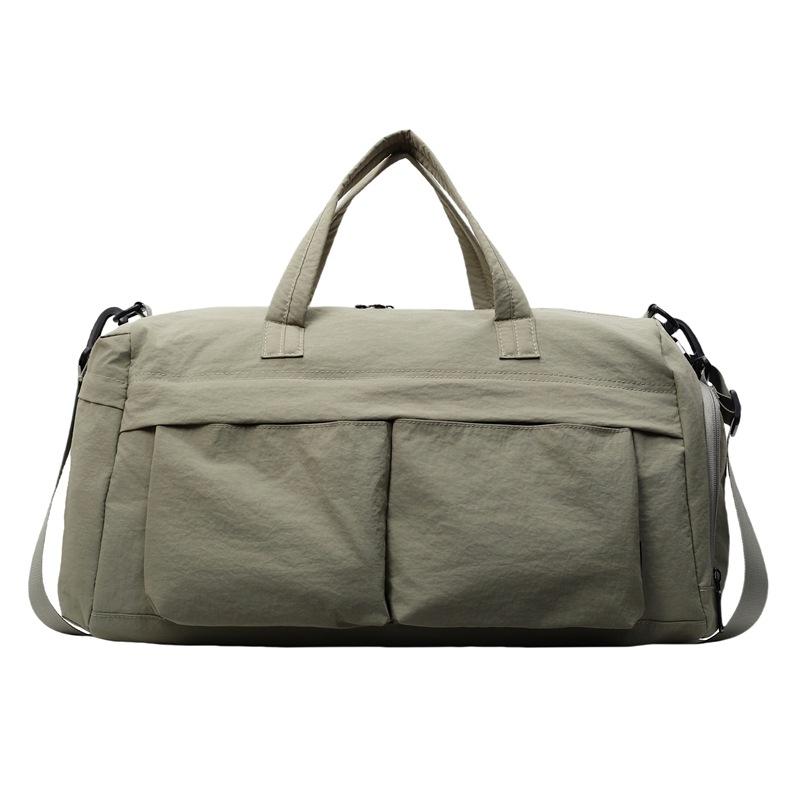 

New solid color business trip travel bag large capacity student accommodation shopping luggage bag women swimming sports fitness yoga світло-зелений колір