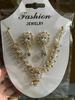 A Set of Classic Fashion Claw Chains Gold Plated Alloy Necklaces Tassels Earrings and Bracelets for Lady