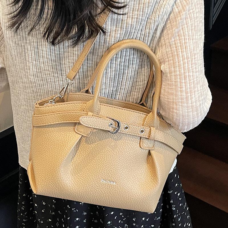 Nischen-Persönlichkeit plissierte tragbare Bucket Bag Damen 2025 Sommer Mode Ausgehen Pendeln lässige Schulter Umhängetasche