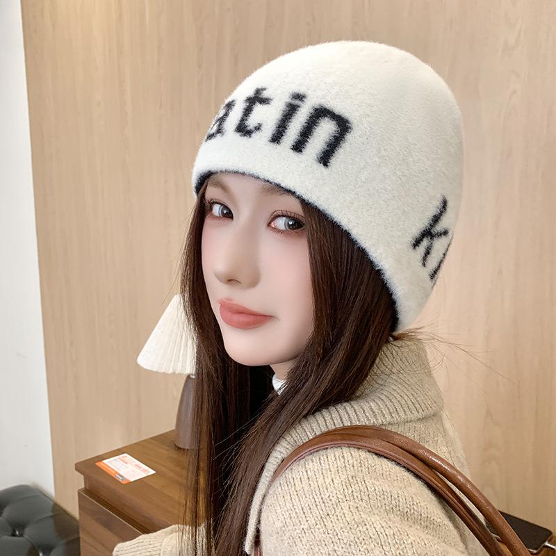 Autumn and winter outdoor mountaineering warm ear protection niche letter knitted hat women