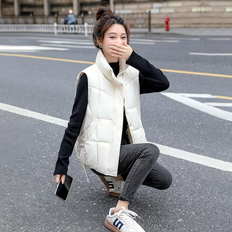 Krátká péřová vesta dámská podzim a zima nová módní volná vesta se stojáčkem univerzální a tenká vnější vesta