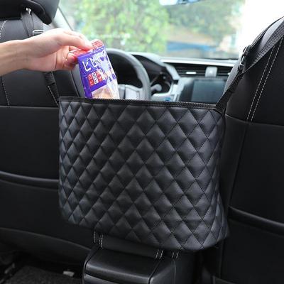 Multifunkční úložný vak na autosedačku s diamantovým vzorem