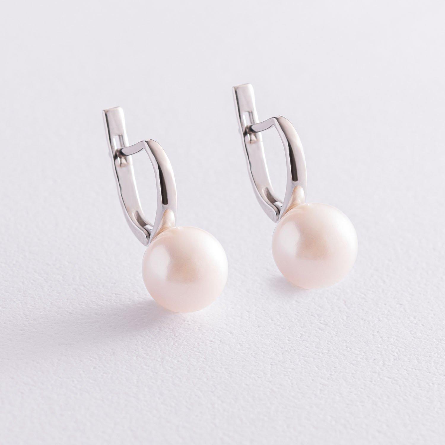 

Срібні сережки з перлами Oniks срібний