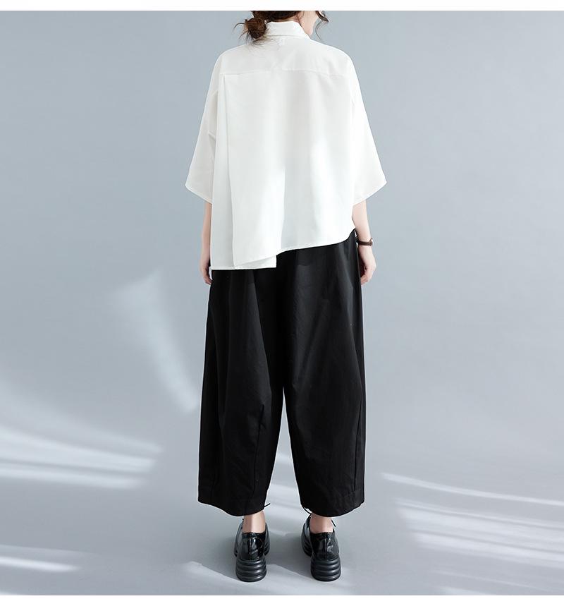 Women's Black Loose-Fit Irregular Top with Three-Quarter Sleeves