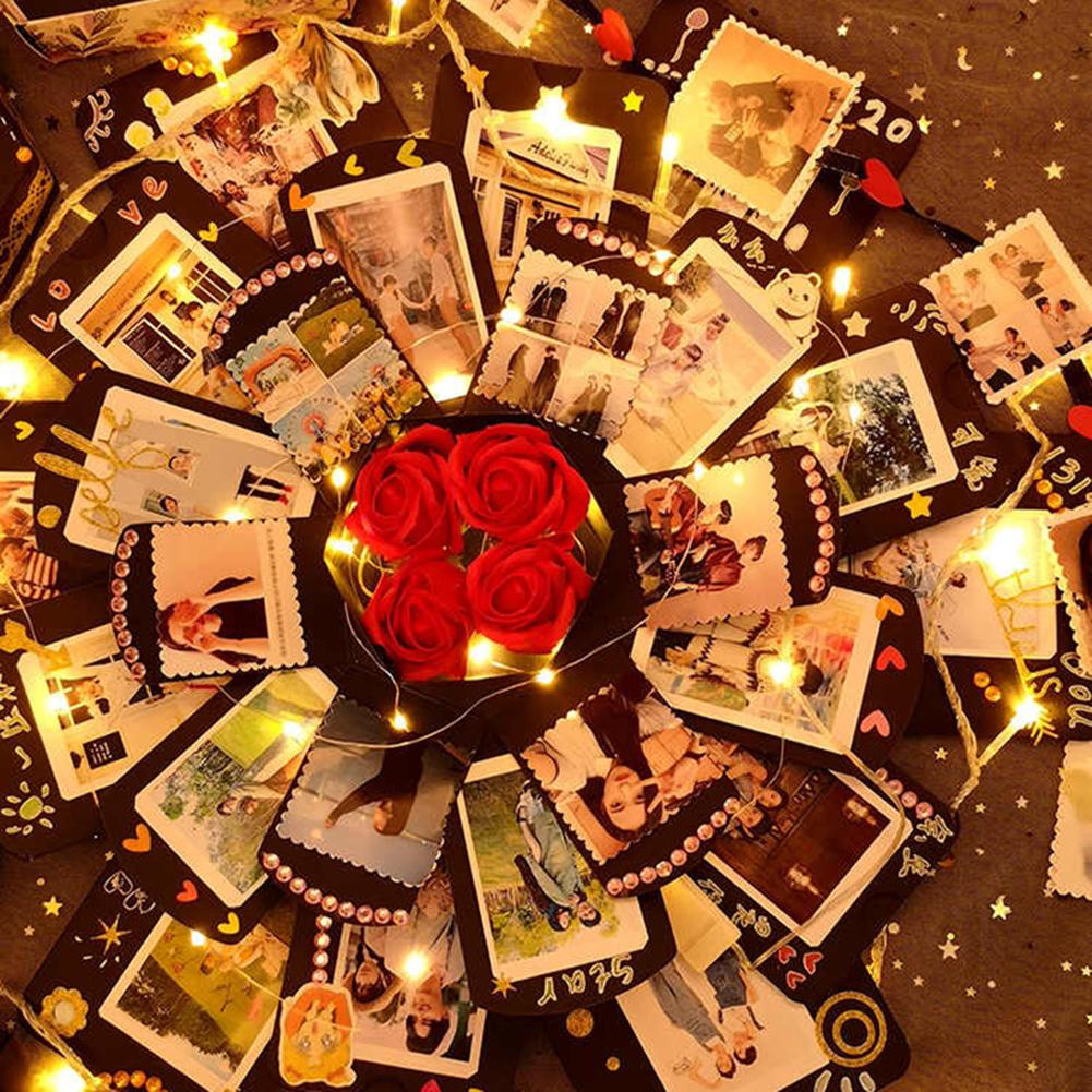 # Caja sorpresa de explosión con álbum de fotos negro creativo para aniversario de cumpleaños