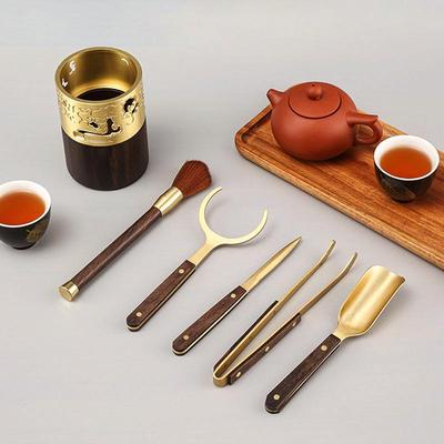 Pure Copper Kung Fu Tea Set: 6-Piece Gentlemen Tea Ceremony Accessories with Wash Cup, Clip, Spoon, Abacus, Pen Holder, and Wooden Elements.
