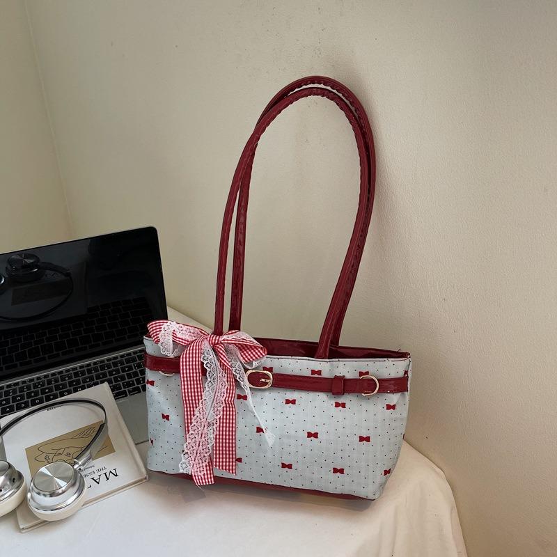 

Niche high-value underarm bag women s new bow printed commuter bag fashionable shoulder handbag tide