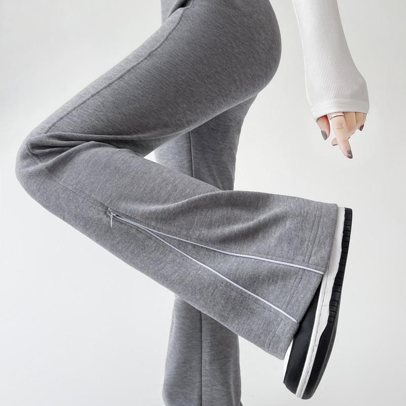 Jesienna Moda Damska Rozszerzane Długie Spodnie 2024 Nowe Elastyczne z Wysokim Stanem Casualowe Dopasowane Spodnie na Zamek Damskie Jednokolorowe Eleganckie Spodnie 2387