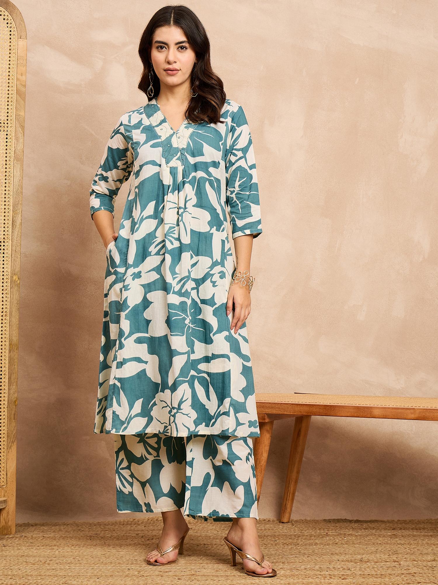 

Туніка А-силуету з квітковим принтом та палаццо XXL рожевий