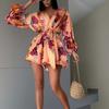 Spring new, European and American women's clothing, fashionable and elegant vacation v-neck printed lace-up dress