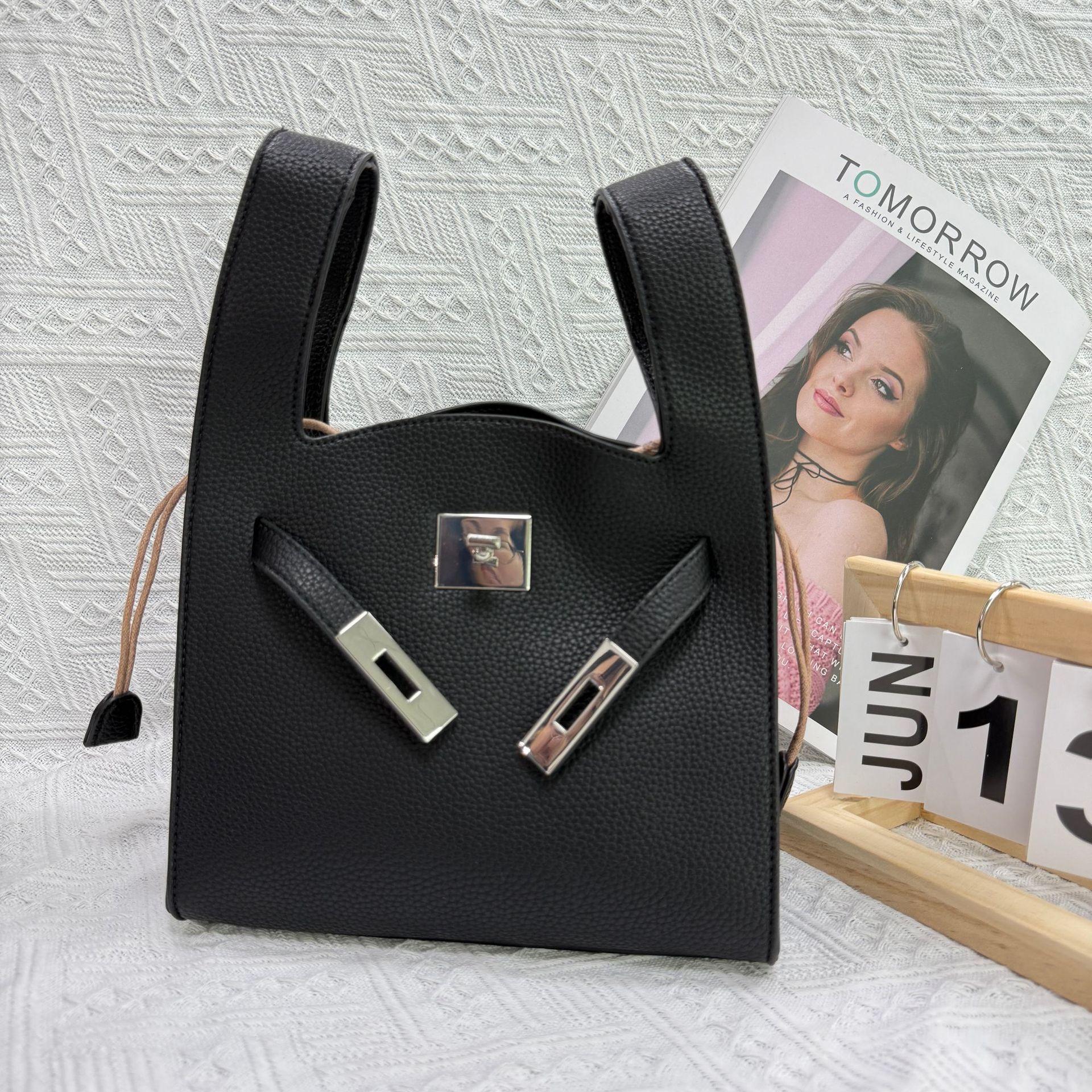 

Нишевый дизайн простой повседневный портативный сумка-мессенджер для поездок на работу женская летняя новая тенденция универсальная сумка-ведро 21*11*18.5cm чёрный