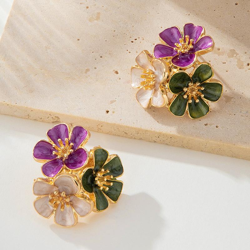 Pendientes de flor de metal dulce estilo coreano con nuevos pendientes de primavera y verano estilo vacaciones frescas
