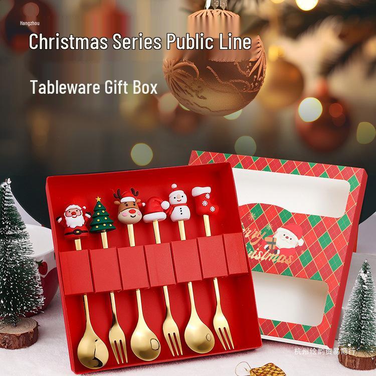 Christmas Cartoon Cutlery Set: Forks, Spoons, and Gift Box Featuring Cute Reindeer and Tree Designs.