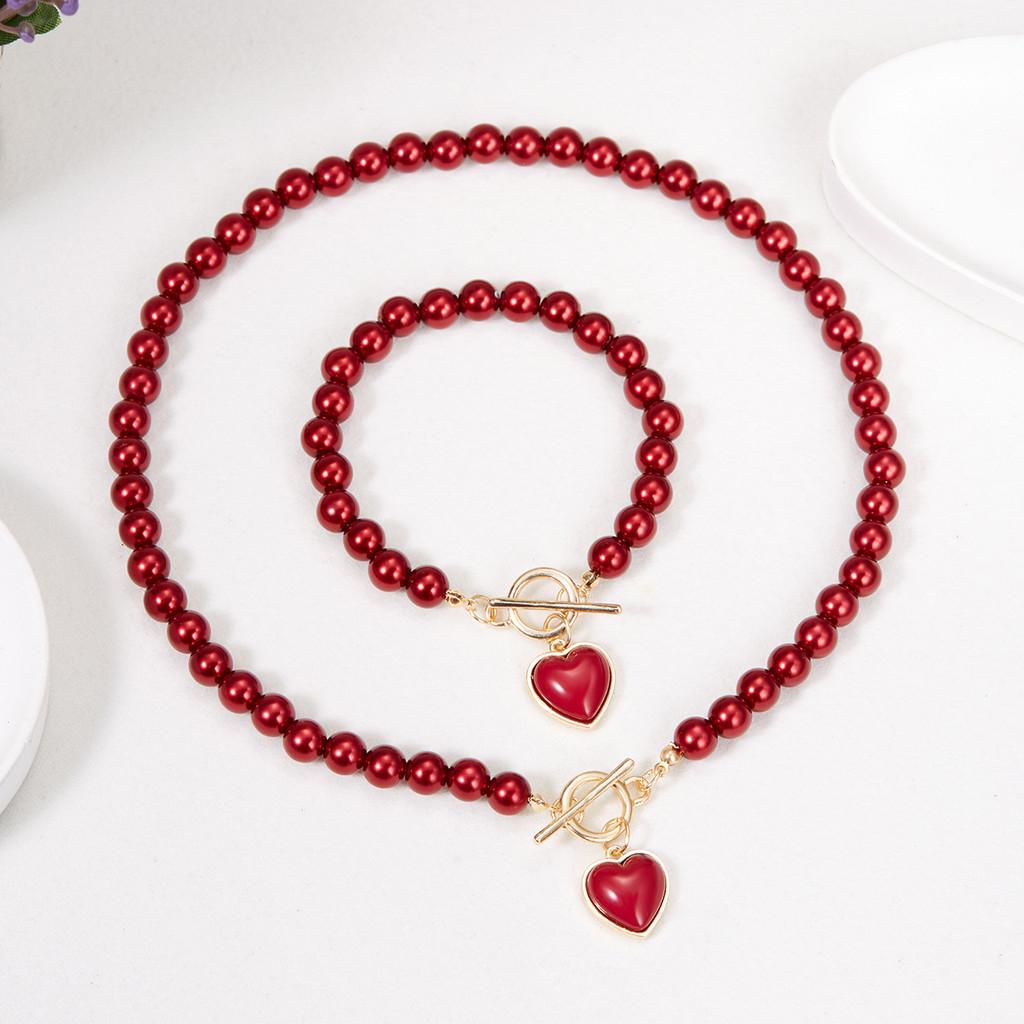 

Elegant Heart Necklace And Bracelet Set For Women With Handcrafted Pearl Craftsmanship For Stylish Office Attire