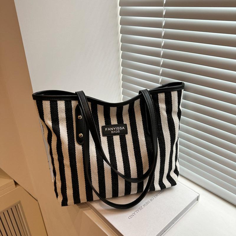 Large-capacity simple striped shoulder bag fashionable contrasting color handbag new casual and beautiful underarm bag