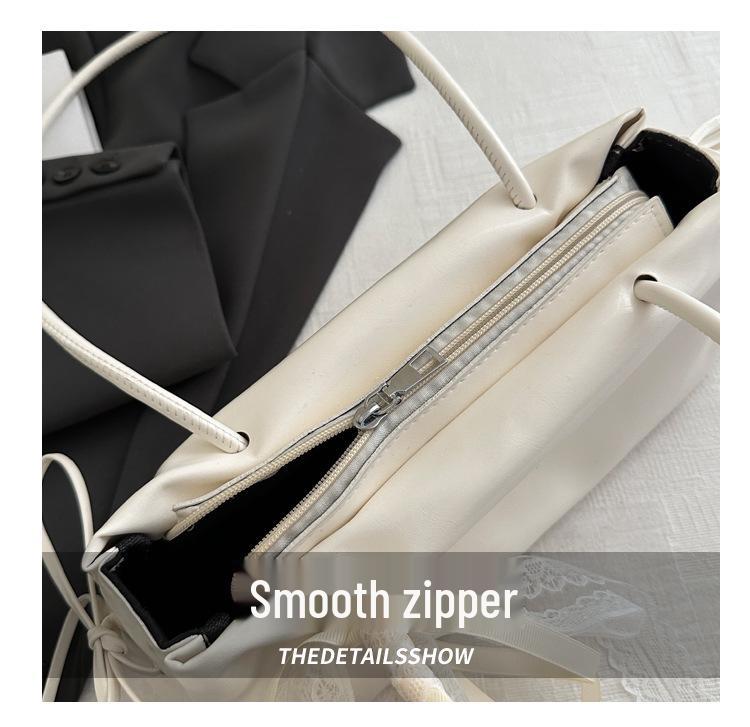 2025 New Oil Wax Leather Bowknot Baguette Bag for Women - Spring/Summer Fashion Simple Texture Underarm Shoulder Bag