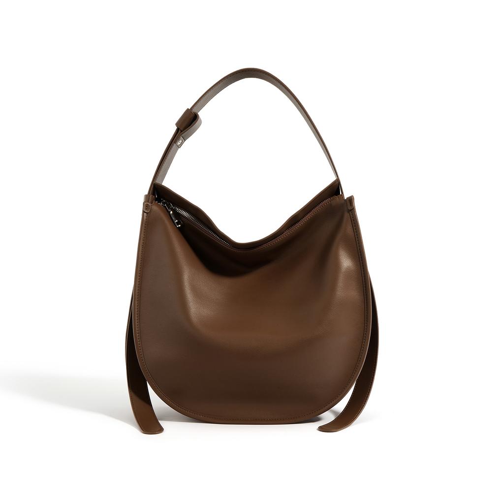 Sac cabas en cuir simple et à la mode Cuir de vachette souple Grande capacité Commuting Polyvalent Simple épaule Bandoulière Sac seau Femmes