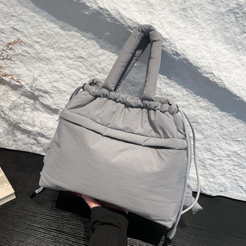 2025 New Large-capacity Shoulder Messenger Bag, Padded Wrist Bag, Lightweight Nylon Cloth Drawstring Messenger Bag, Backpack.