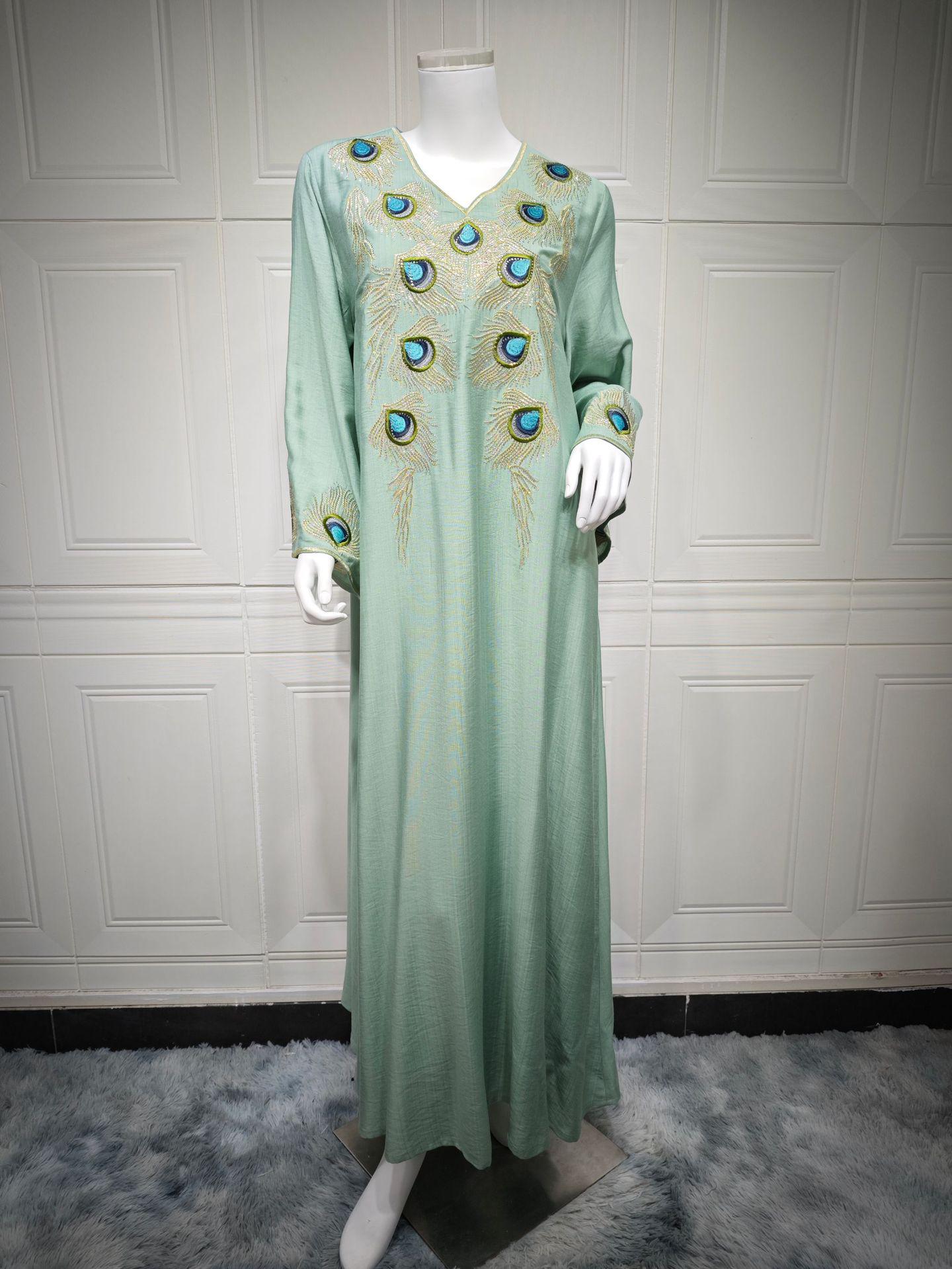 

AB429 Элегантное трикотажное платье-пуловер с вышивкой для мусульманок S светло-зеленый