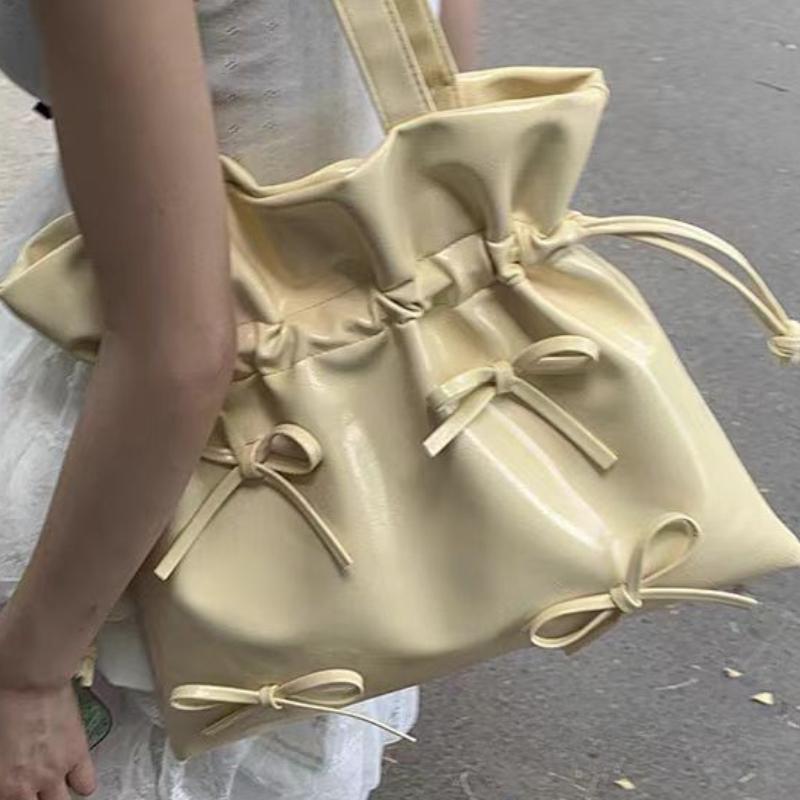 

Корейский нишевый дизайнерский стиль плиссированная сумка-ведро на кулиске сумка-тоут милый бантик ручная подмышечная на плечо жёлтый