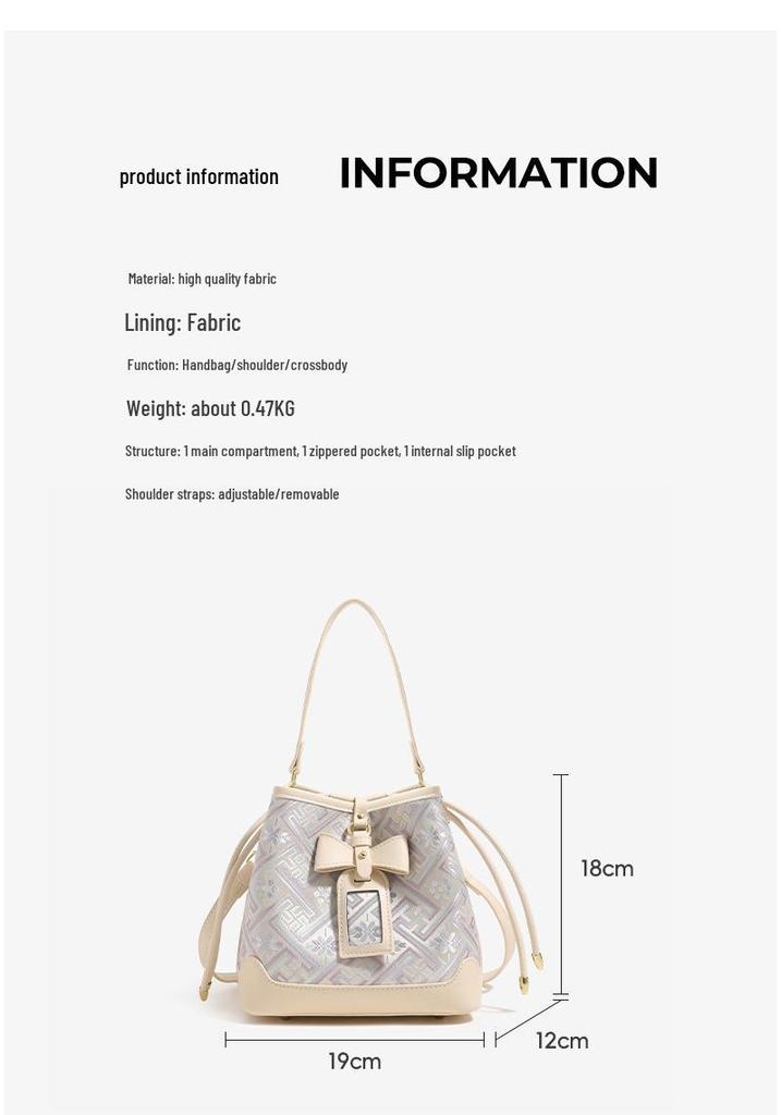 Guangxi Zhuang Brocade Heritage Women's Bow Drawstring Bag - 2026 New Chinese Style Crossbody Bucket Bag