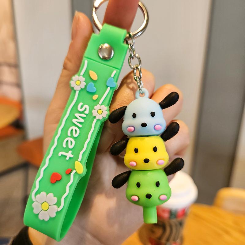 Yugui Dog Gestapelter Le Schlüsselanhänger Niedlicher Cartoon Melody Pudding Dog PVC Puppe Taschenanhänger