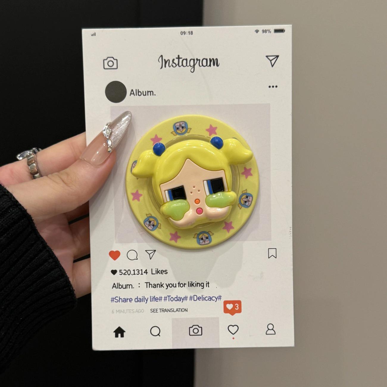 Yellow Crying Cartoon Doll Magsafe-Compatible Magnetic Phone Holder with Retractable, Foldable Design for Women