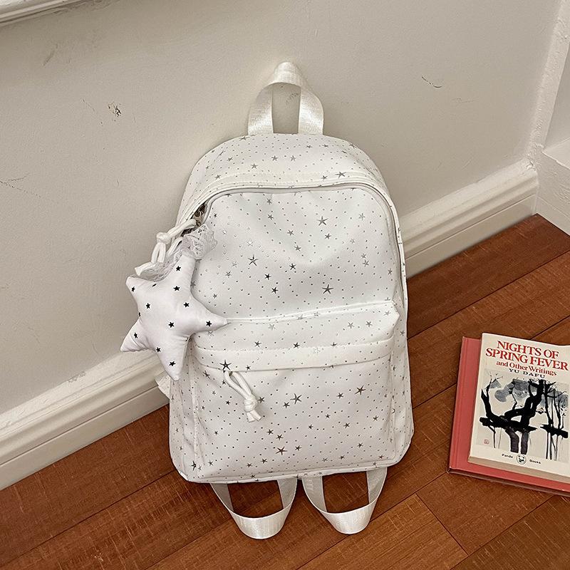 Star-printed nylon backpack, lightweight casual backpack, large-capacity student schoolbag, universal travel backpack