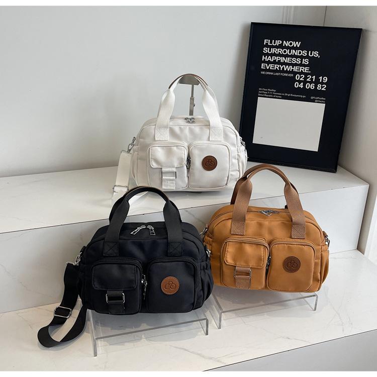 Multi-pocket retro casual handbag 2025 new nylon bag simple shoulder messenger bag