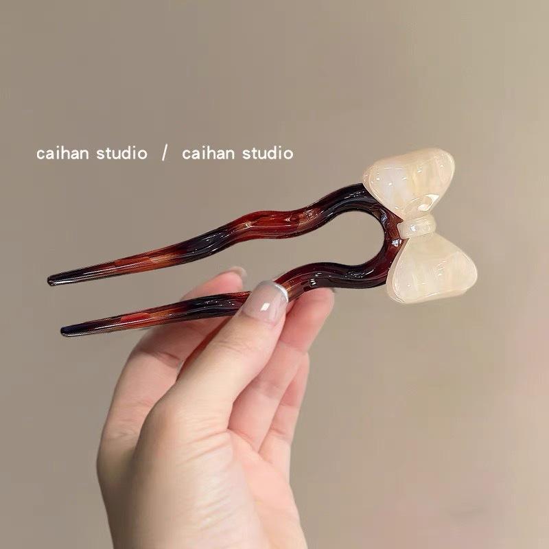 

French Retro Acetic Acid Bow U-shaped Hairpin Women s High-end Sense 2024 New Summer Meatball Head Artifact