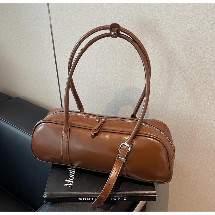 

Сумка подмышку женская новая модная нишевая ощущение на плечо женская сумка-багет коричневый